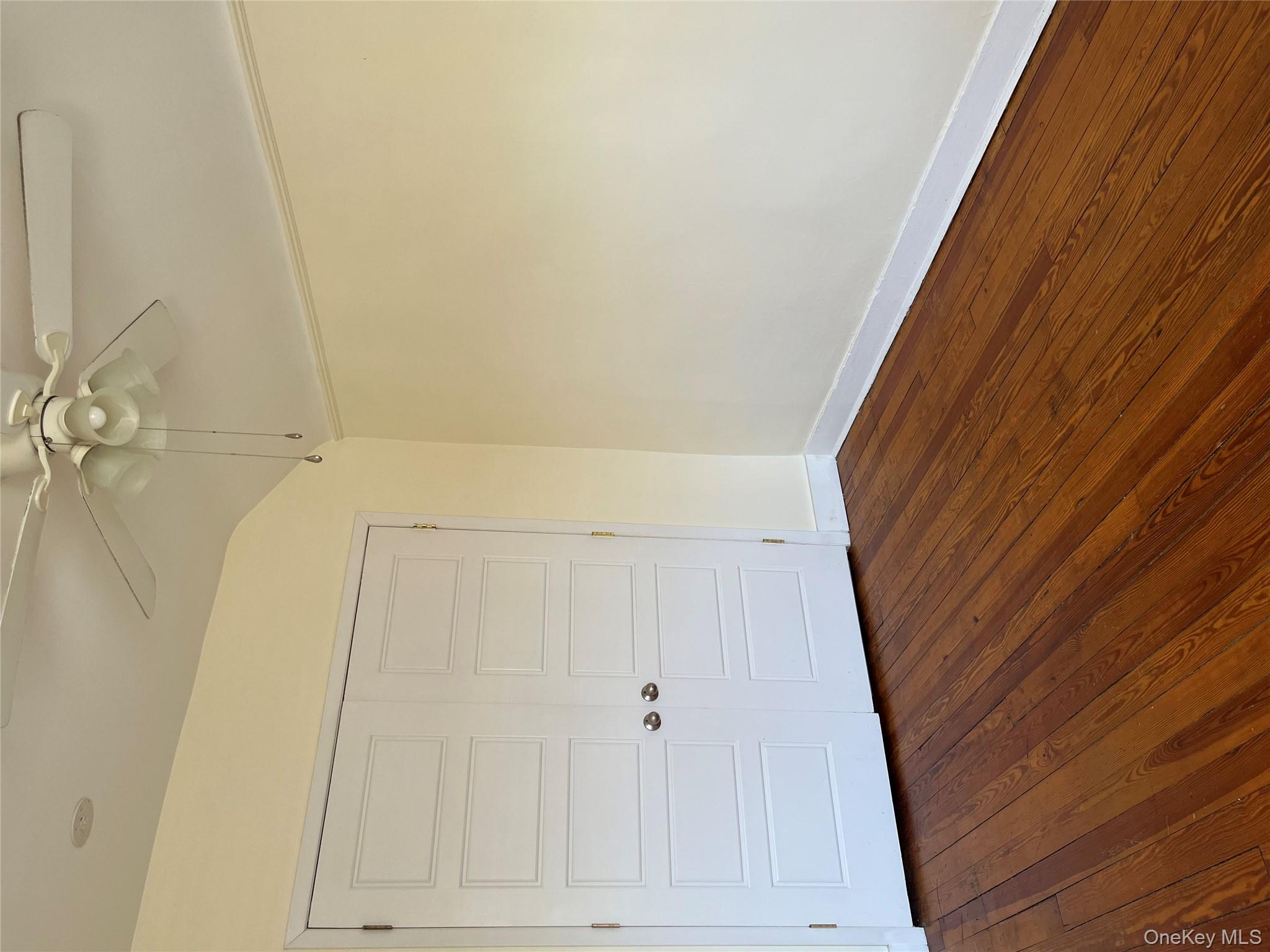 51 Parkway Road, Unit 3 Bronxville, NY 10708 - Photo 13 of 20 a view of an empty room with wooden floor
