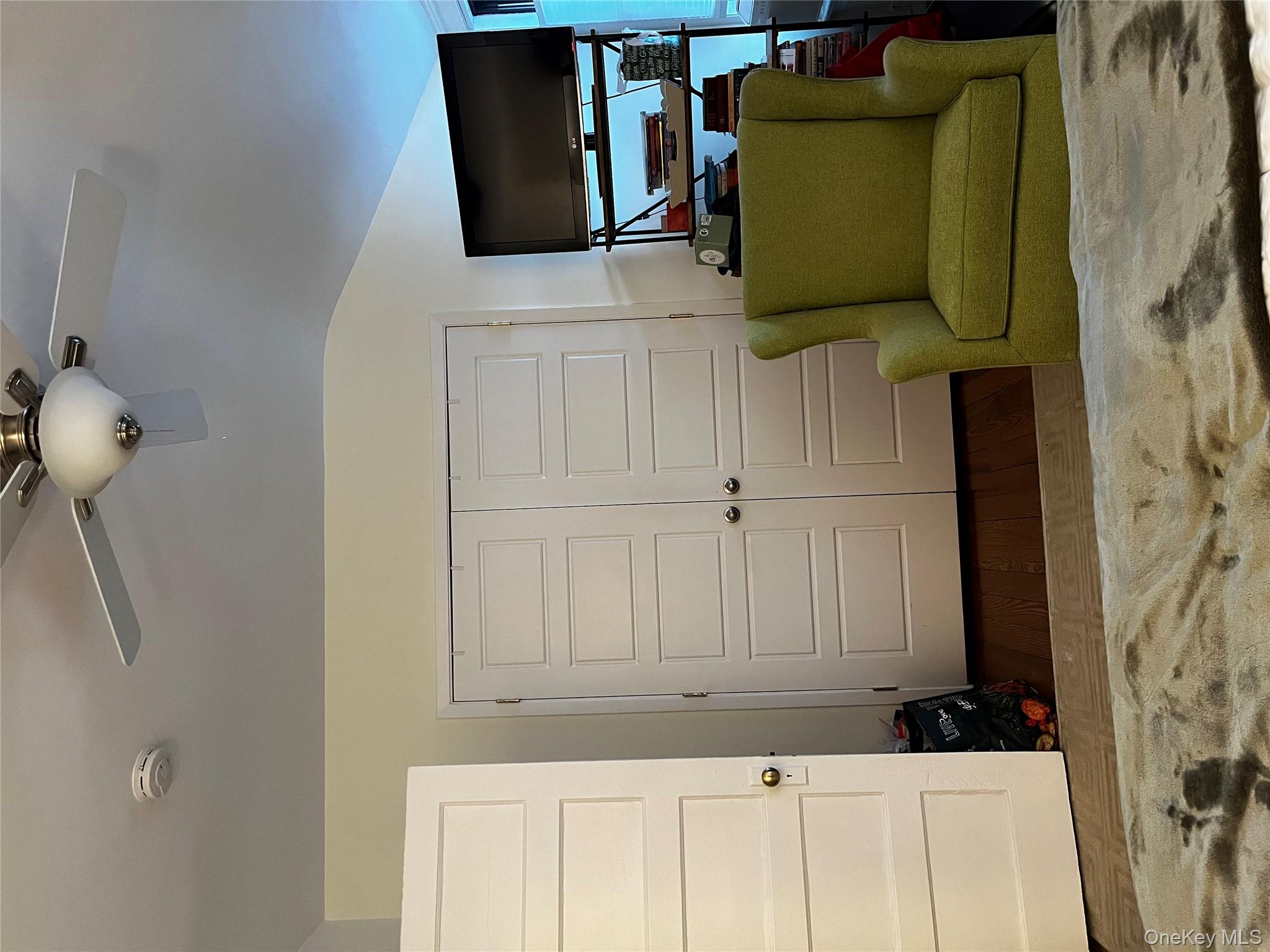 51 Parkway Road, Unit 3 Bronxville, NY 10708 - Photo 6 of 20 a living room with furniture and a flat screen tv