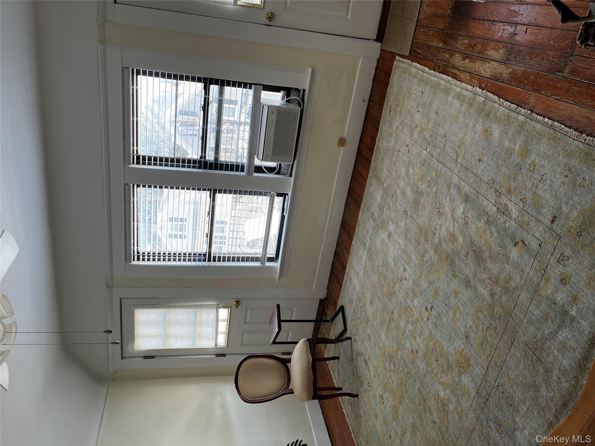 51 Parkway Road, Unit 3 Bronxville, NY 10708 - Photo 9 of 20 a living room with furniture and a large window