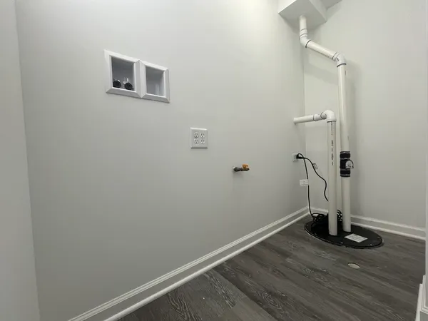 a view of small space with wooden floor