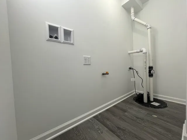 a view of small space with wooden floor