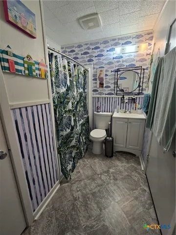 a view of a porch with wooden floor and sink
