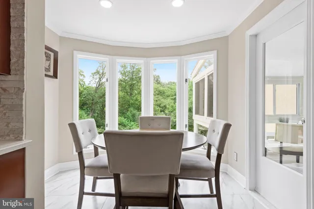 a living room with furniture and windows