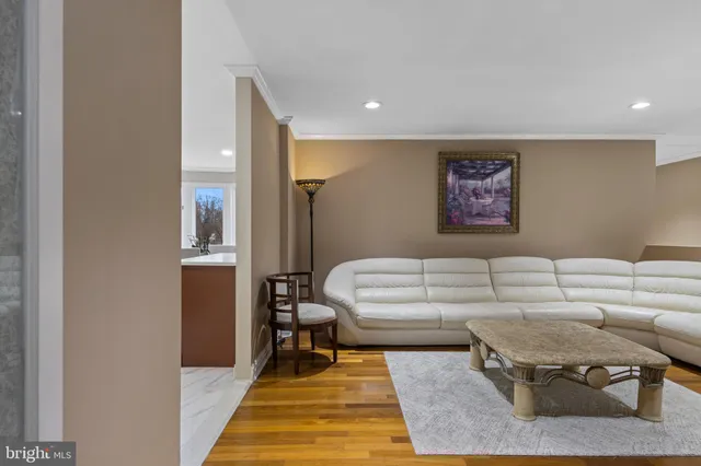 a view of a livingroom with furniture and stairs