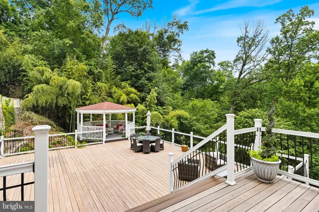 a view of a white building with large windows