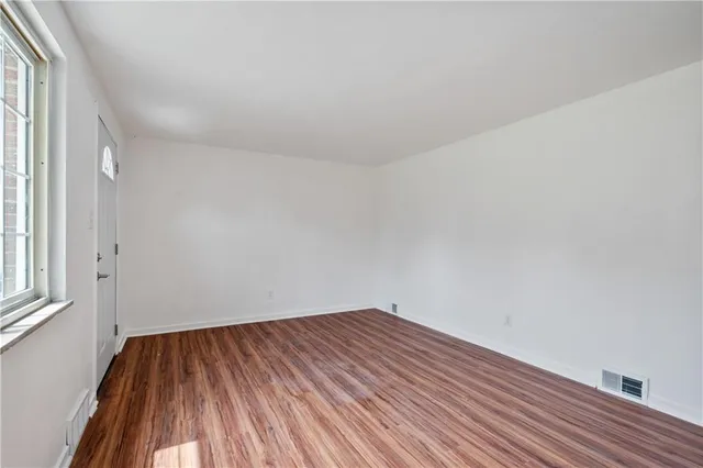 an empty room with a window