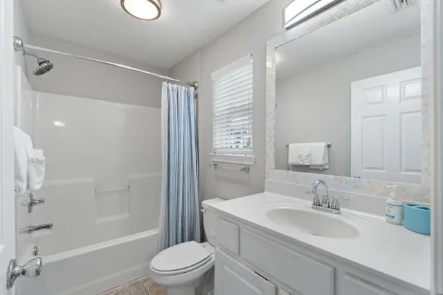 a bed room with a bed and a table