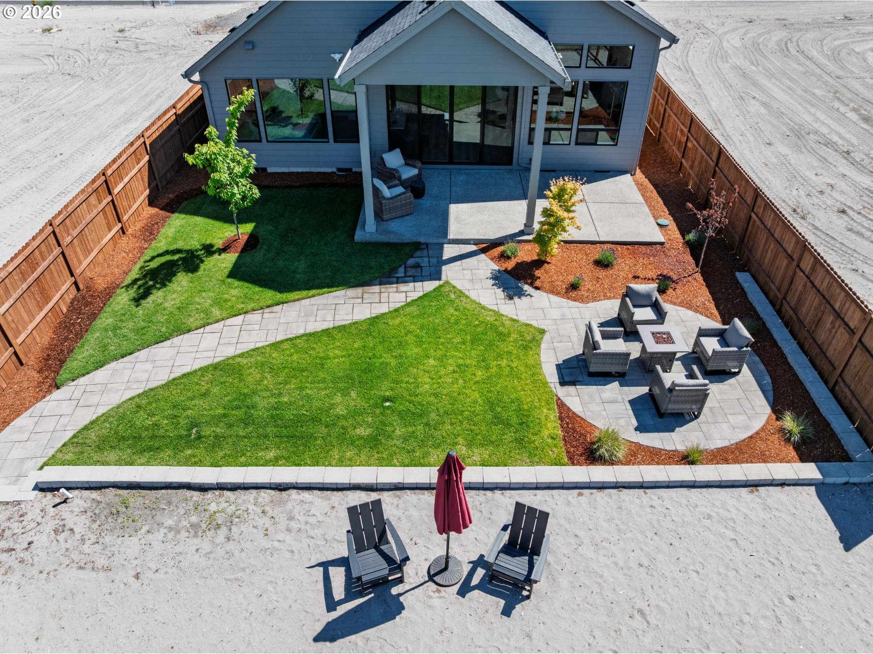 2072 South River Road Kelso, WA 98626 - Photo 14 of 20 a view of a backyard with sitting area and slide