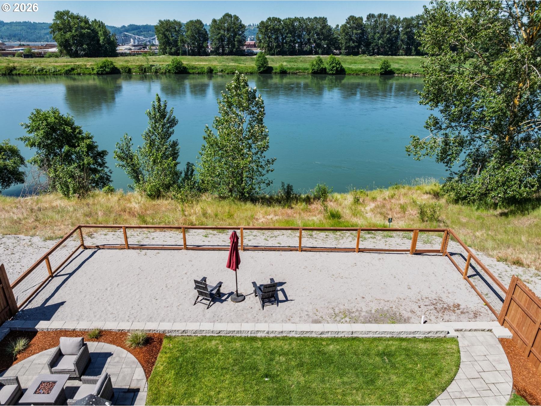 2072 South River Road Kelso, WA 98626 - Photo 16 of 20 a view of a swimming pool with a lake view