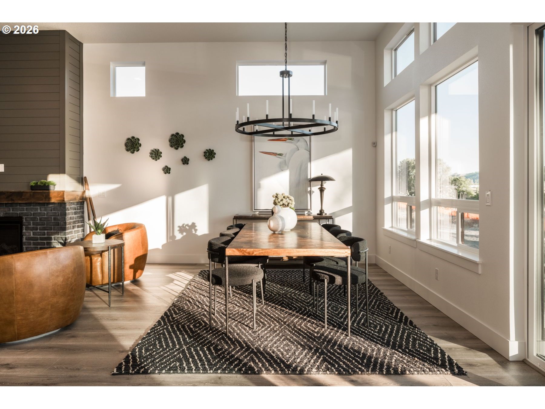 2072 South River Road Kelso, WA 98626 - Photo 4 of 20 a dining room with furniture a chandelier and wooden floor