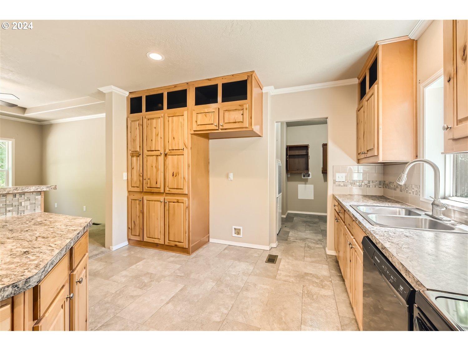 42290 Southeast Shipley Road Sandy, OR 97055 - Photo 7 of 17 a kitchen with a sink stove and cabinets