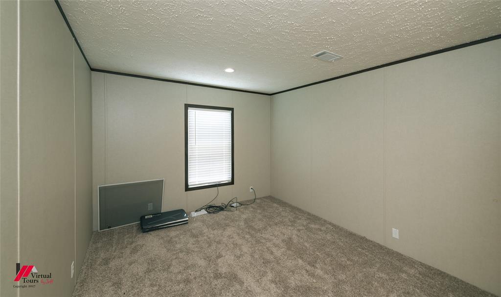 810 Chalybeate Springs Road Plain Dealing, LA 71064 - Photo 14 of 38 Second bedroom