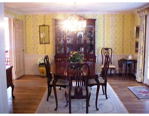 23 Salem Road Wellesley, MA 02481 - Photo 3 of 11 a view of a dining room with furniture and chandelier