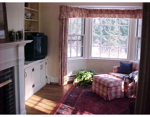 23 Salem Road Wellesley, MA 02481 - Photo 4 of 11 a living room with furniture and a flat screen tv