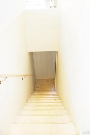 a picture of a room with a bench