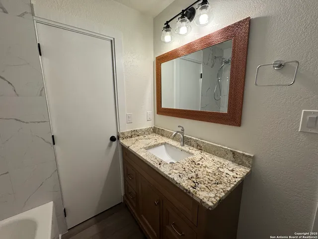 a view of room with racks on the wall