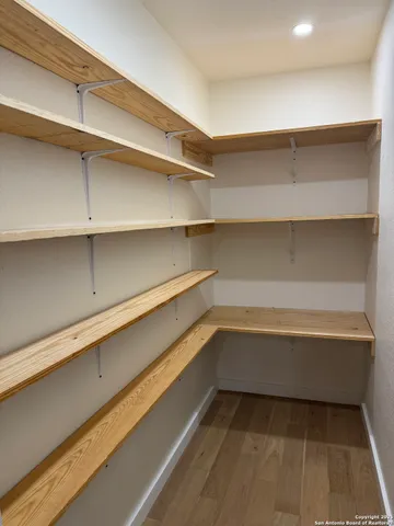 a storage room with cabinets