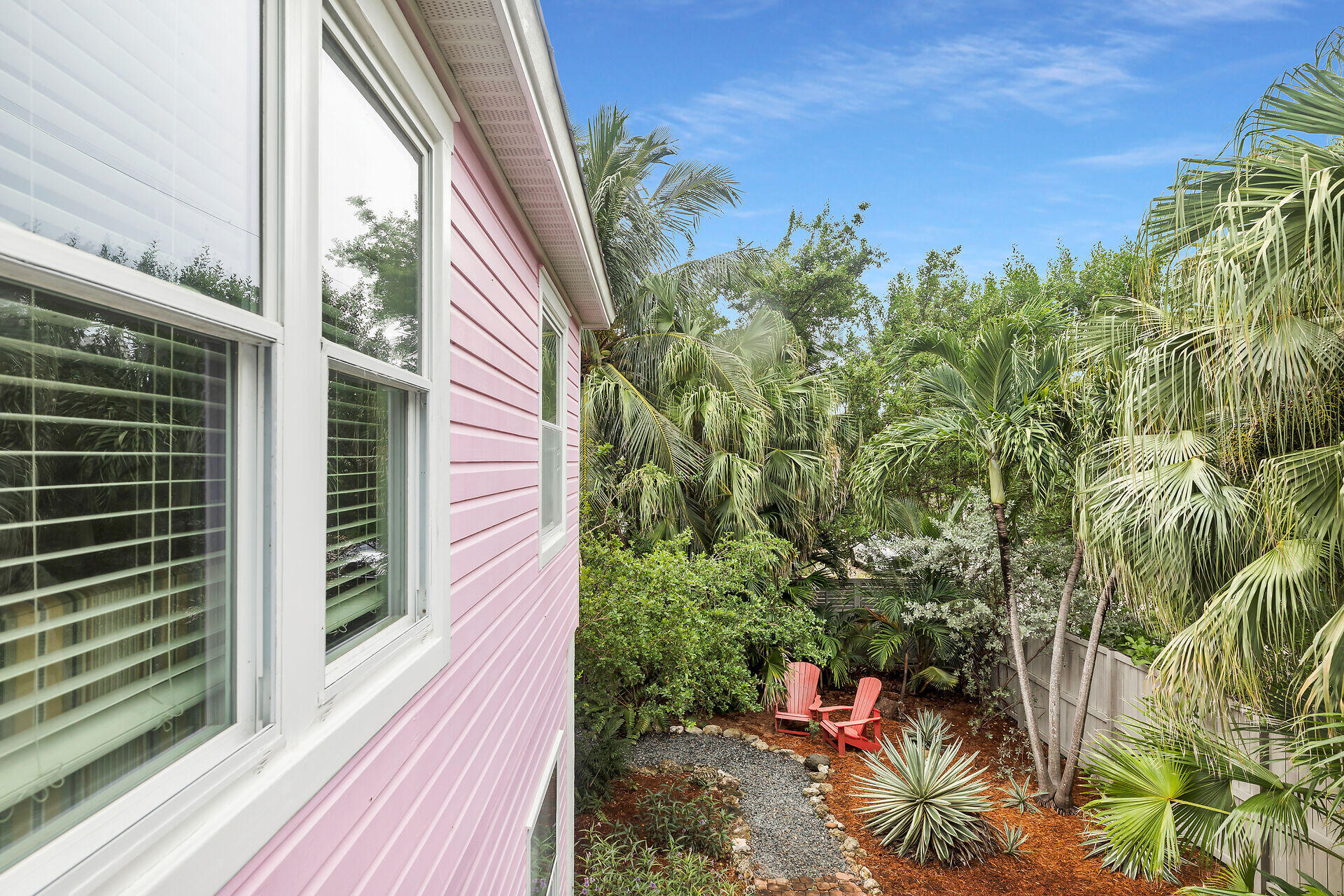 1301 Atlantic Drive Key West, FL 33040 - Photo 20 of 37 a backyard of a house with outdoor seating