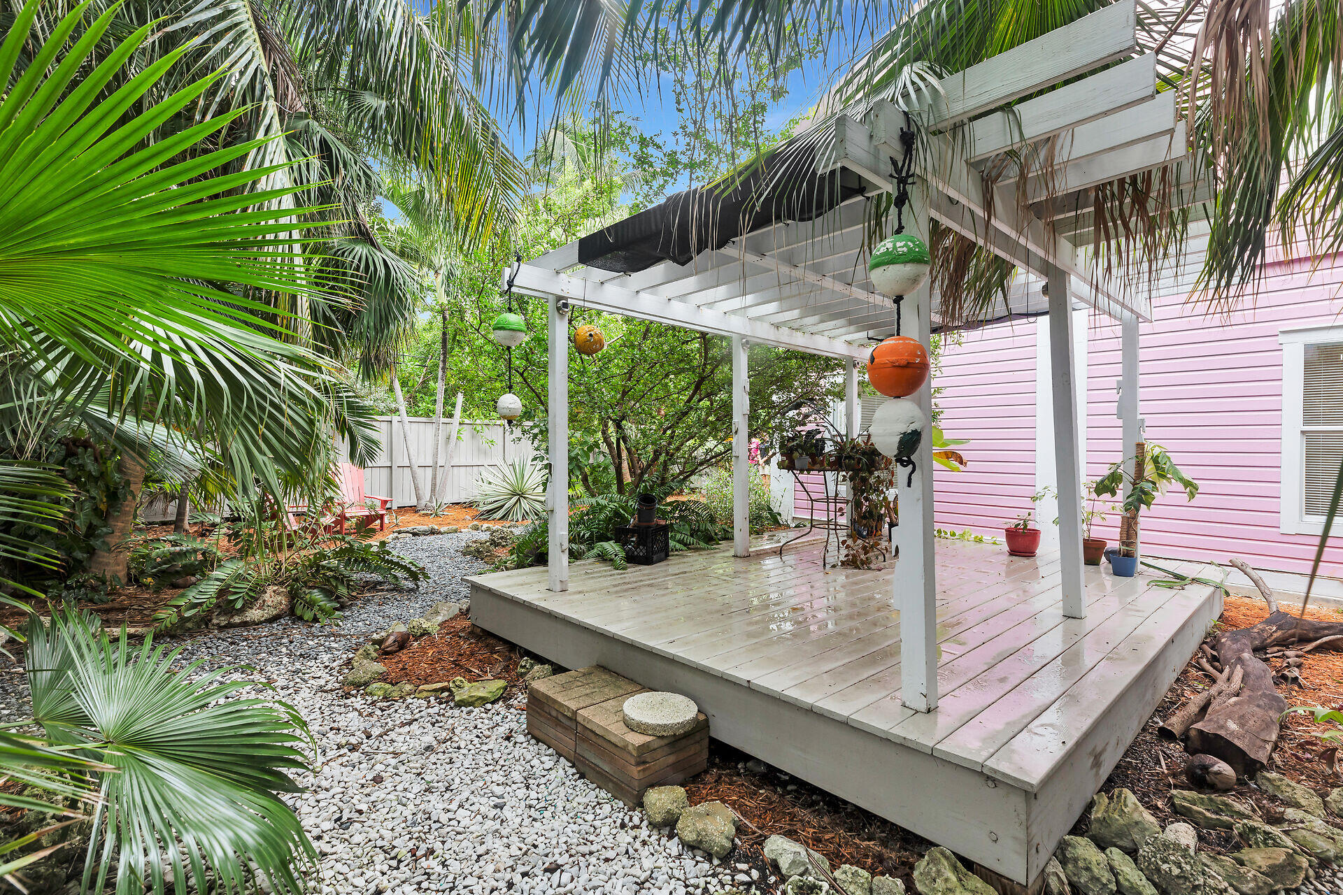 1301 Atlantic Drive Key West, FL 33040 - Photo 23 of 37 a view of a chairs and table in the patio