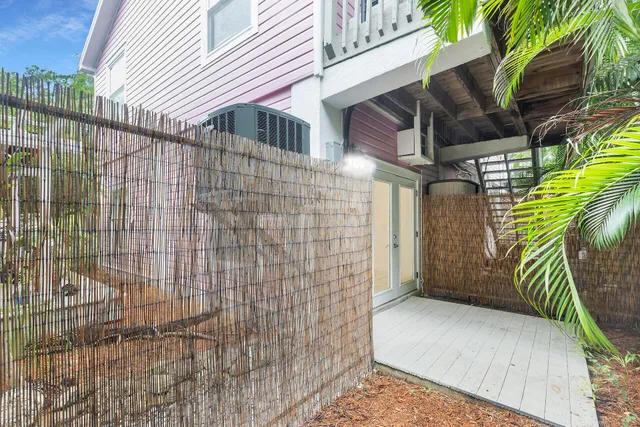a view of a house with a street