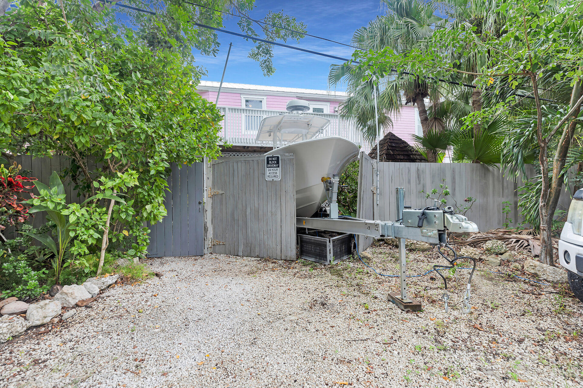 1301 Atlantic Drive Key West, FL 33040 - Photo 37 of 37 a backyard of a house with table and chairs