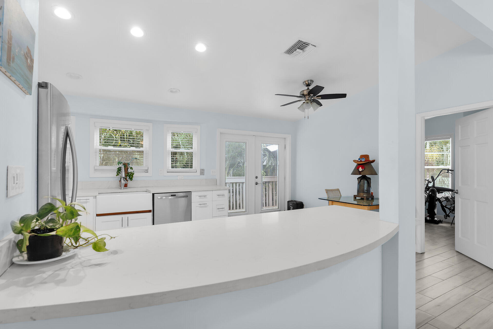 1301 Atlantic Drive Key West, FL 33040 - Photo 6 of 37 a view of living room with furniture and a chandelier