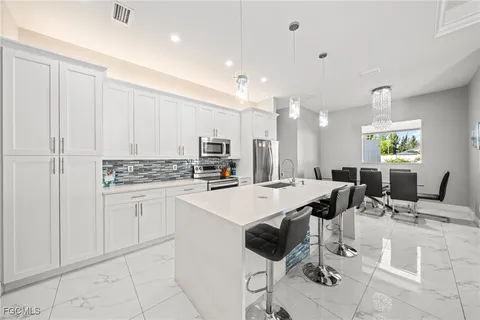 $499,000 | 325 Tropicana Parkway East, Cape Coral, FL 33909