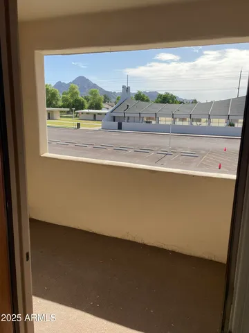 a view of a balcony with an ocean view