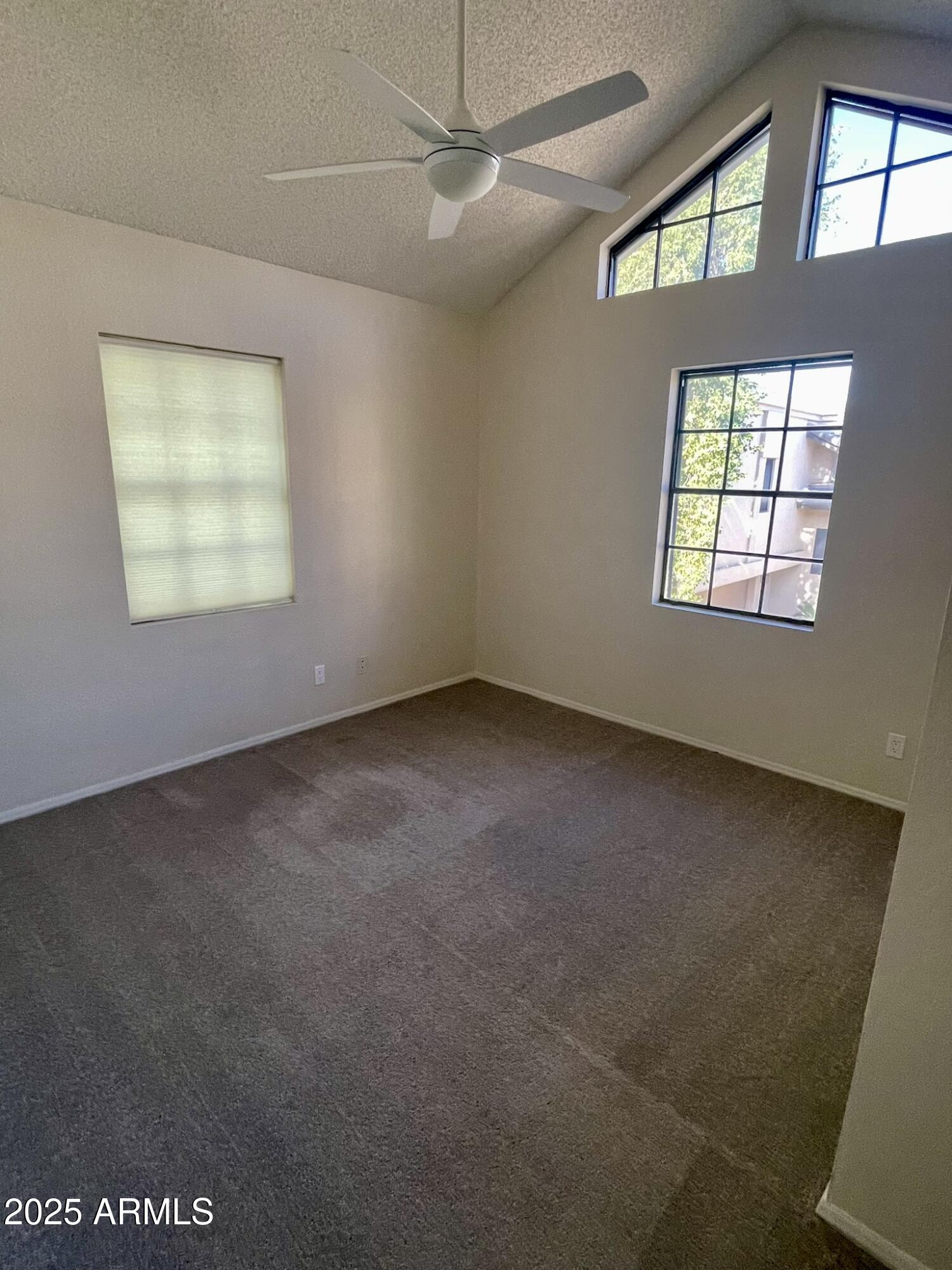 1124 East Rose Lane, Unit 3 Phoenix, AZ 85014 - Photo 19 of 32 en empty room with windows