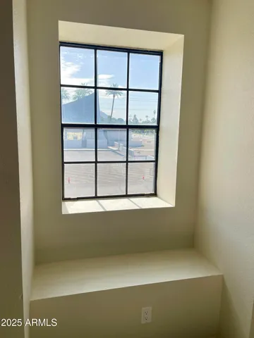 a view of a small space with a window