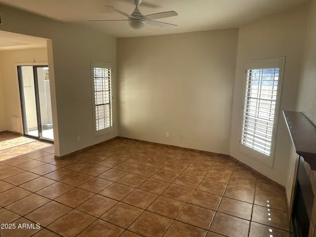 a view of an empty room and window
