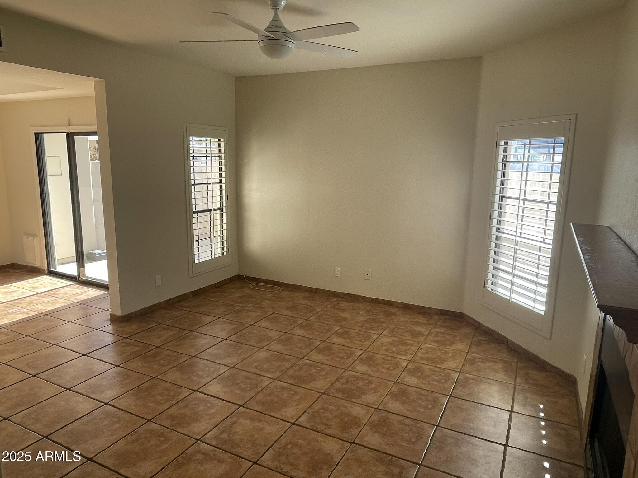 1124 East Rose Lane, Unit 3 Phoenix, AZ 85014 - Photo 2 of 32 a view of an empty room and window