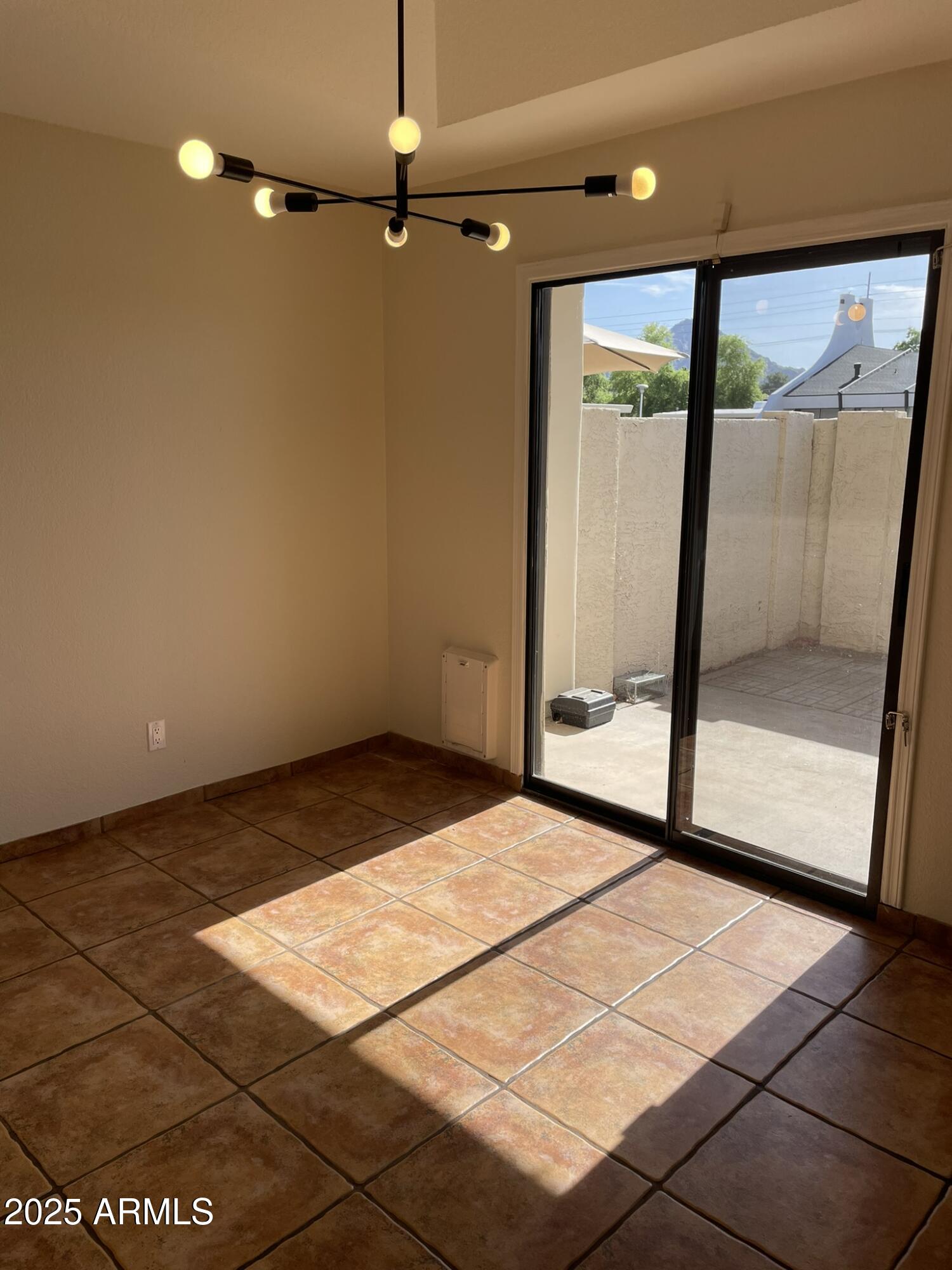 1124 East Rose Lane, Unit 3 Phoenix, AZ 85014 - Photo 10 of 32 a view of an empty room