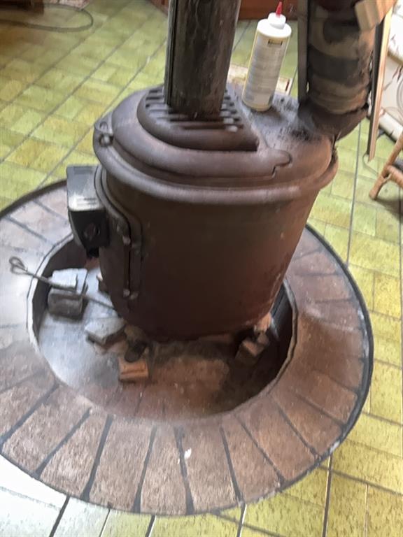 2424 Northeast 170th Street Citra, FL 32113 - Photo 17 of 53 a water heater sitting in the middle of a floor