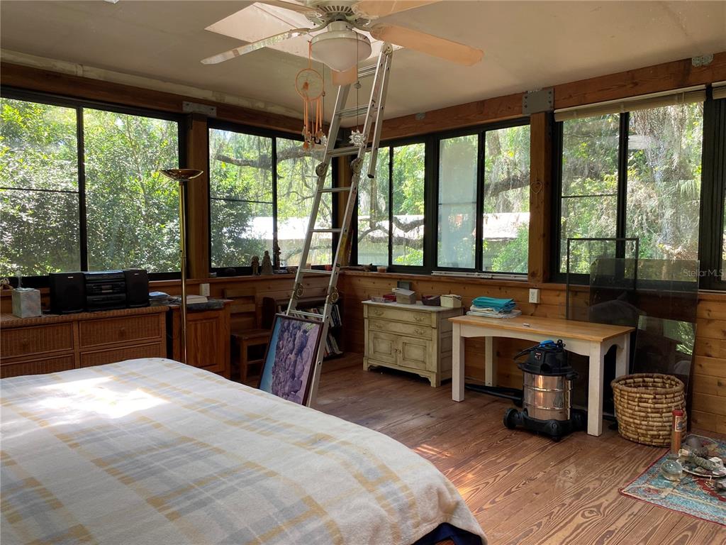 2424 Northeast 170th Street Citra, FL 32113 - Photo 2 of 53 a very nice looking room with a large window