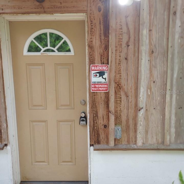 2424 Northeast 170th Street Citra, FL 32113 - Photo 28 of 53 a view of front door