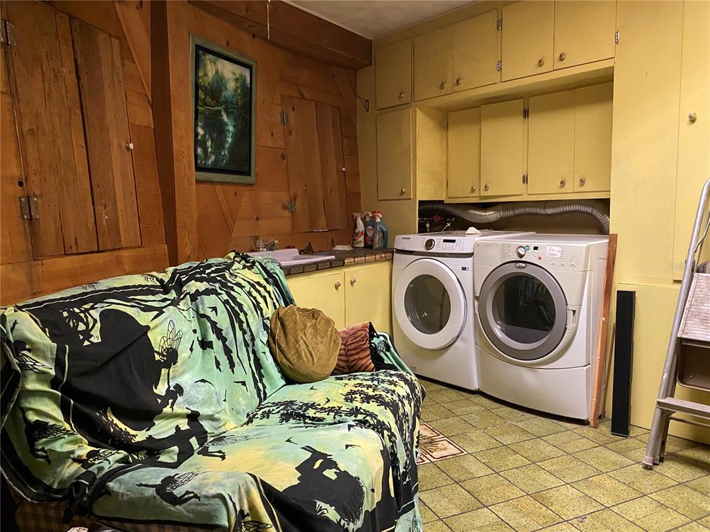 2424 Northeast 170th Street Citra, FL 32113 - Photo 29 of 53 a utility room with dryer and washer