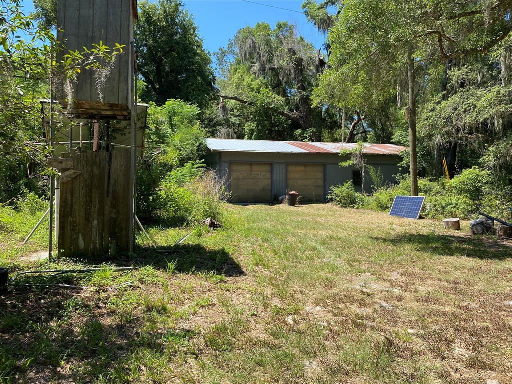 2424 Northeast 170th Street Citra, FL 32113 - Photo 53 of 53 a view of a garden with plants