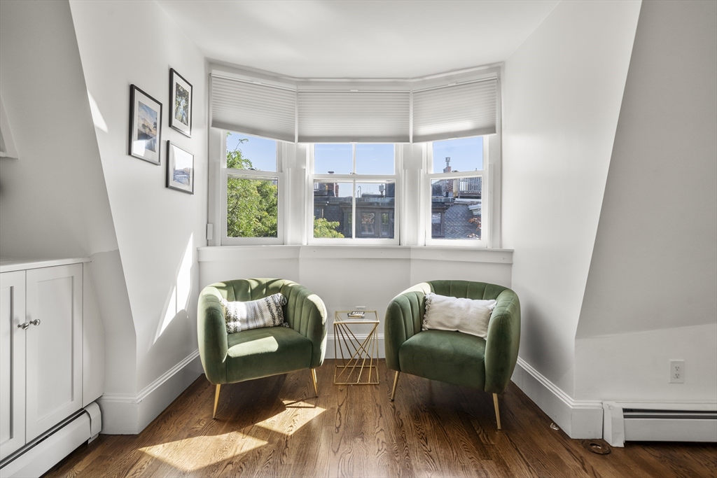 36 Upton Street, Unit 3 Boston, MA 02118 - Photo 13 of 33 a view of a livingroom with furniture and windows