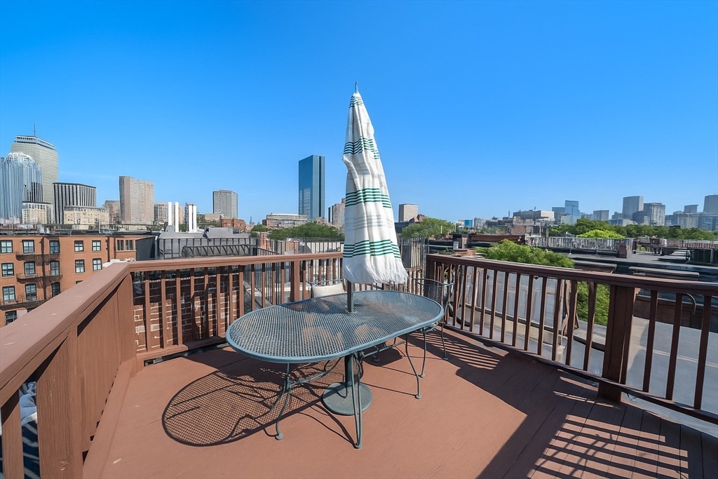 36 Upton Street, Unit 3 Boston, MA 02118 - Photo 30 of 33 a view of a balcony with chairs