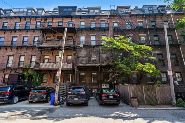 a car parked in front of a building