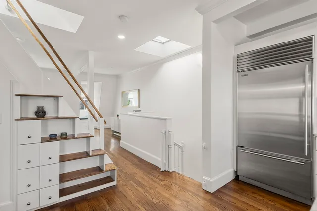 a view of entryway with wooden floor