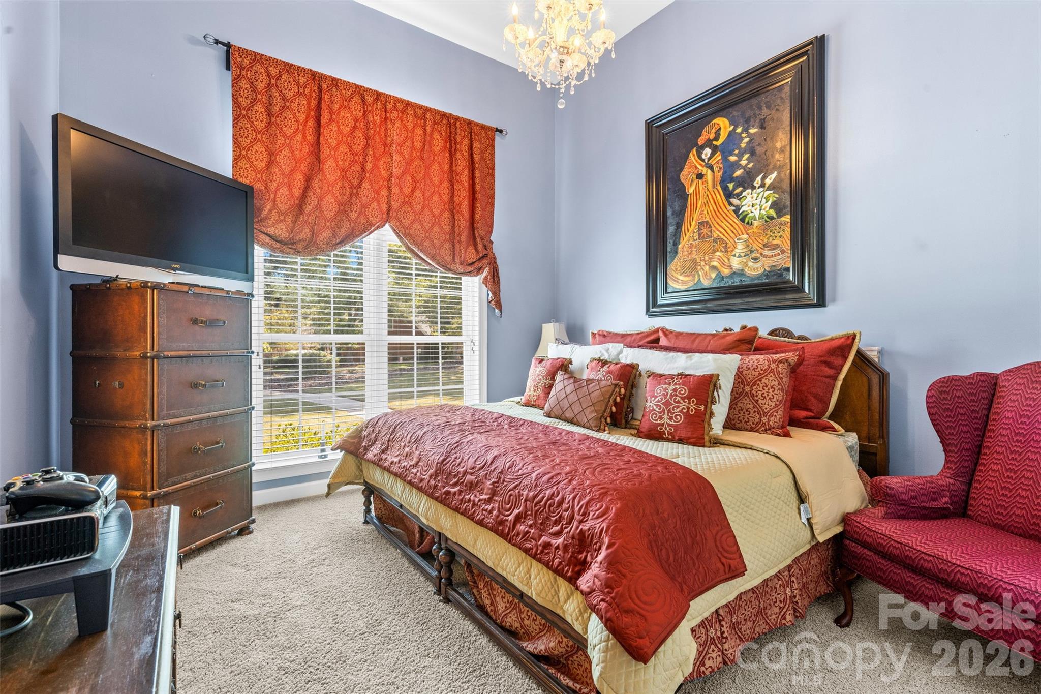 1337 Braeburn Road Northwest Concord, NC 28027 - Photo 18 of 36 a bedroom with a bed and a window