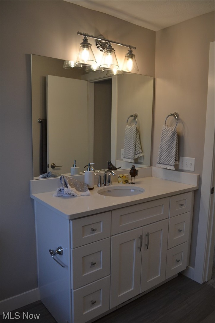 3693 Stoer Road Shaker Heights, OH 44122 - Photo 30 of 35 Bathroom with wood-type flooring and vanity