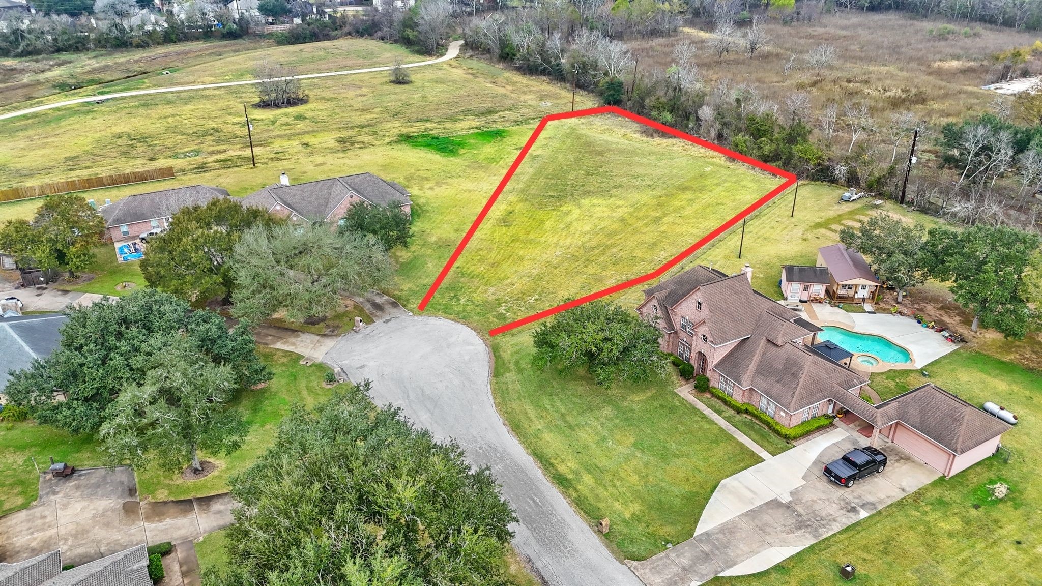 a view of swimming pool with a yard