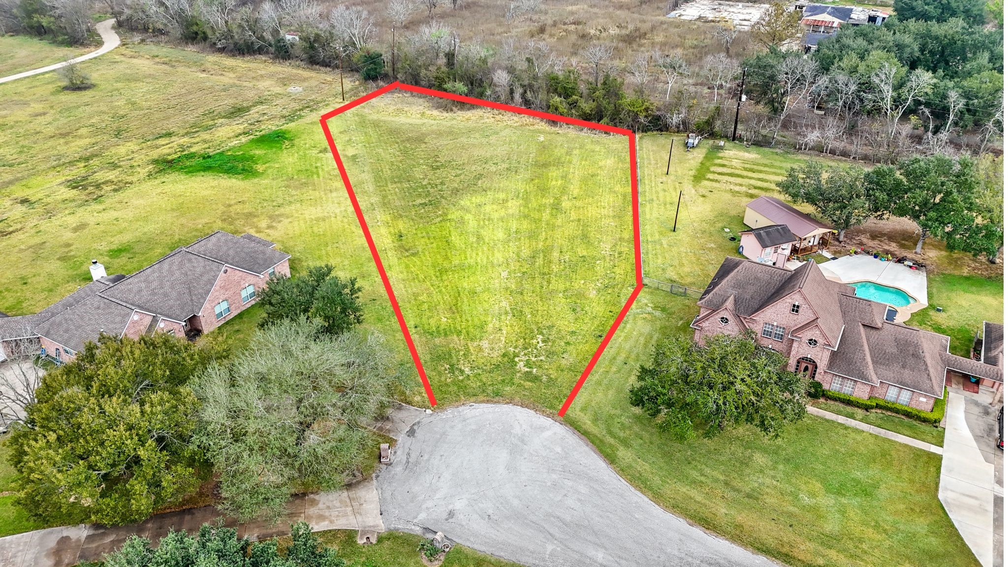 0 Rabb Ridge Drive Richmond, TX 77469 - Photo 2 of 11 a view of swimming pool with a garden and seating area