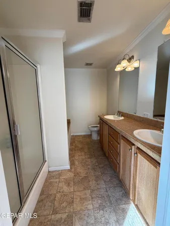 a view of a kitchen from the hallway