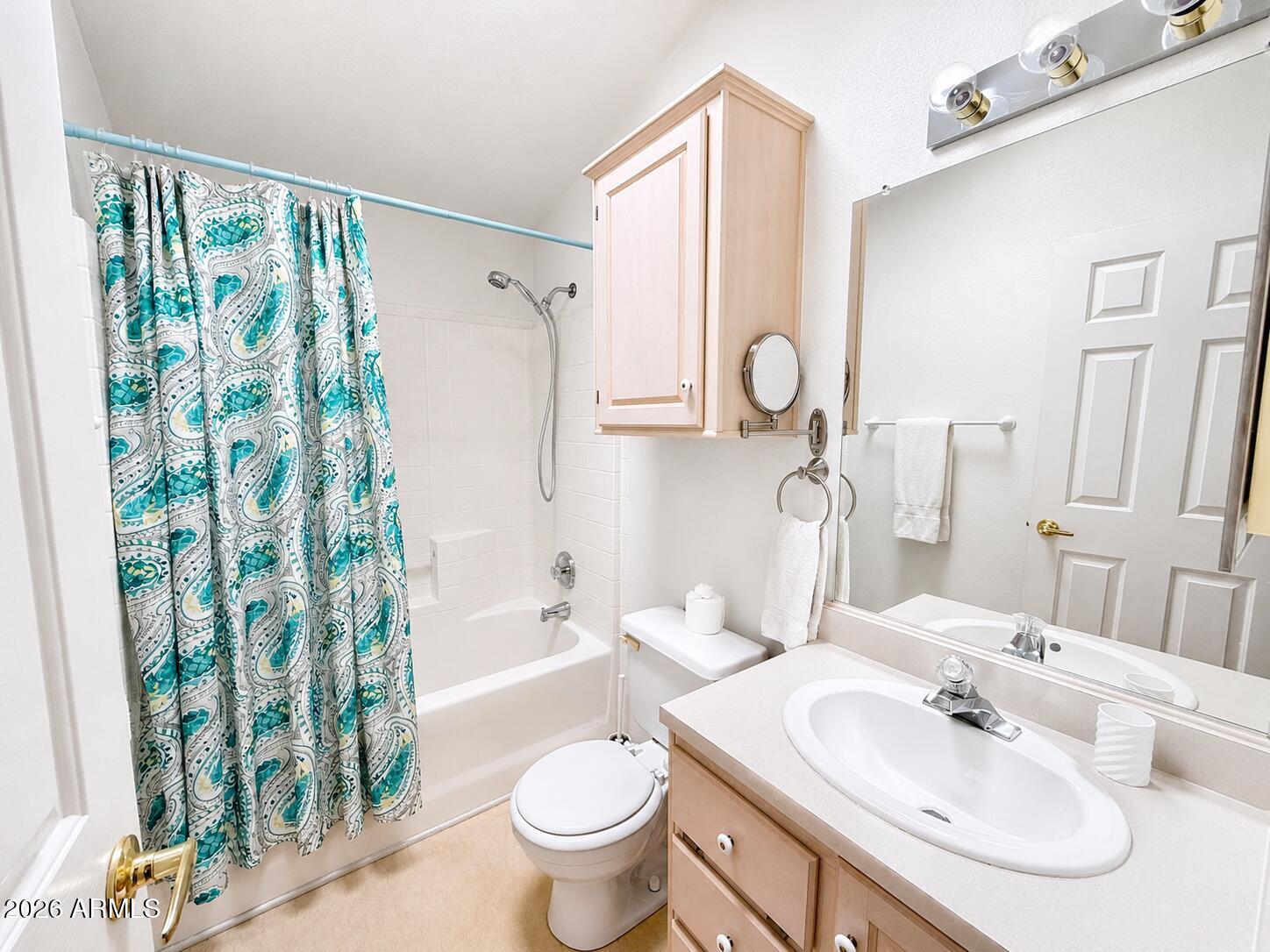 8865 East Baseline Road, Unit 103 Mesa, AZ 85209 - Photo 26 of 47 a bathroom with a sink toilet and shower