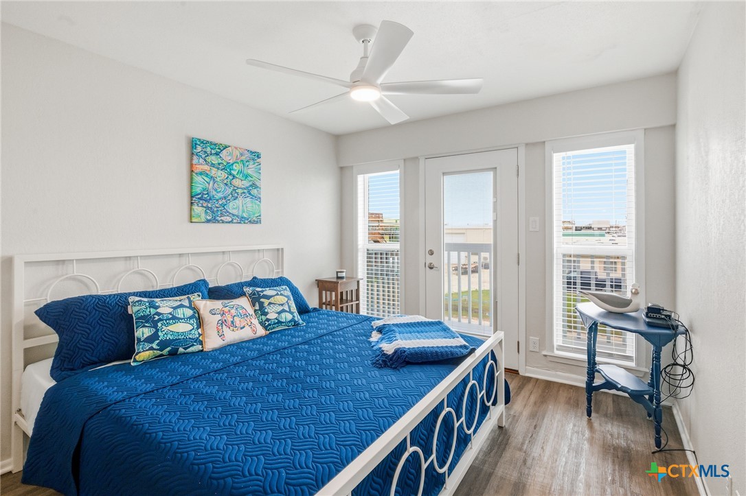 520 15th Street Port O'Connor, TX 77982 - Photo 12 of 36 a bedroom with a bed and a table