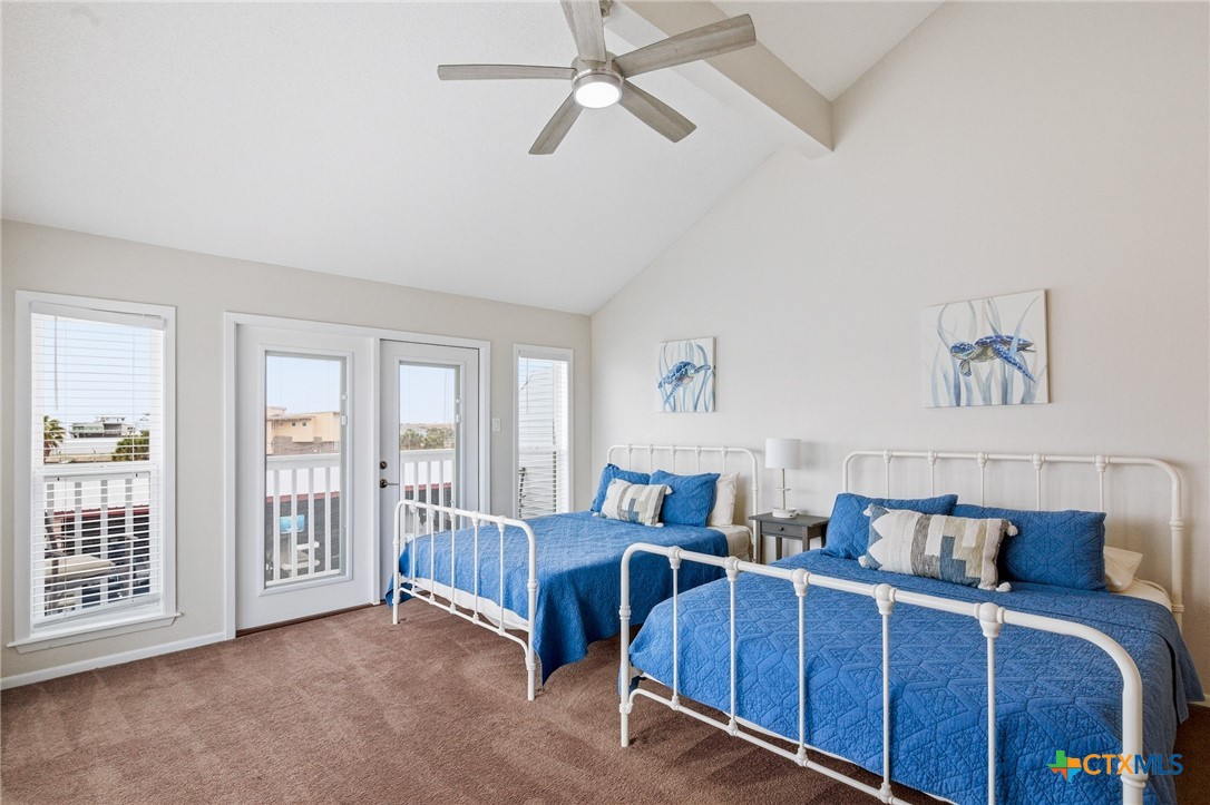 520 15th Street Port O'Connor, TX 77982 - Photo 23 of 36 a living room with furniture and a flat screen tv